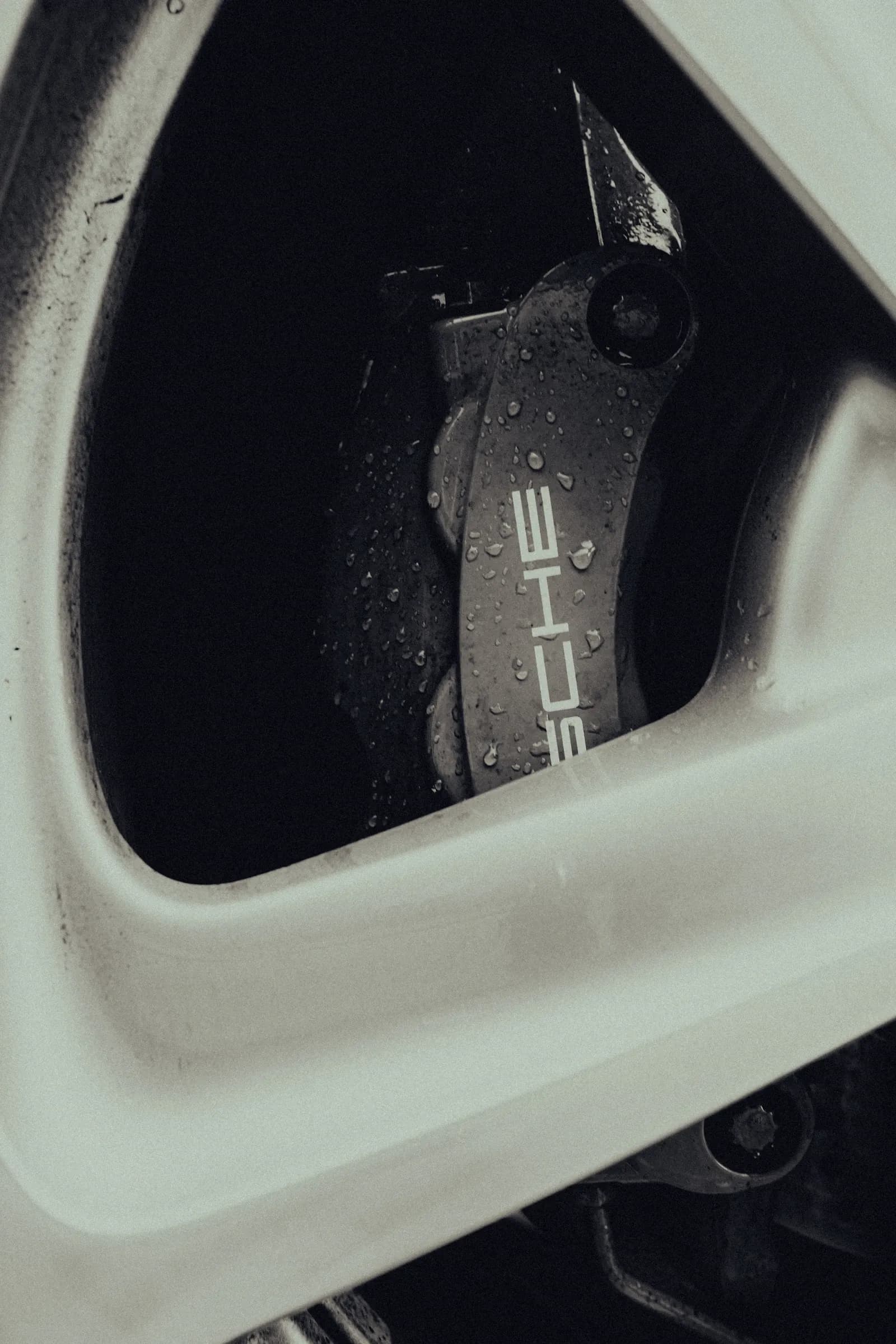 Close-up of a vehicle wheel, brake and hub area related to ABS sensor diagnosis